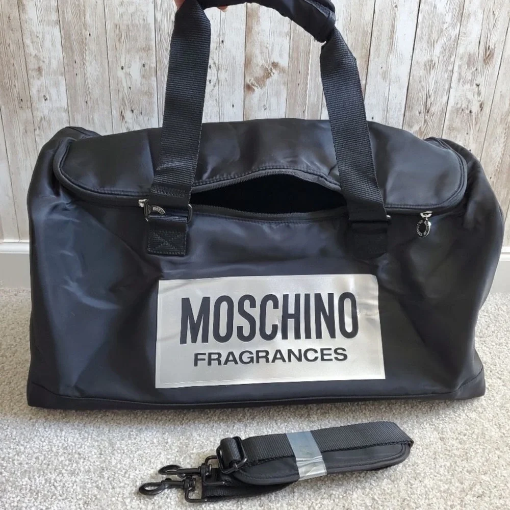 Moschino Black Duffel Bag with Silver Logo Patch